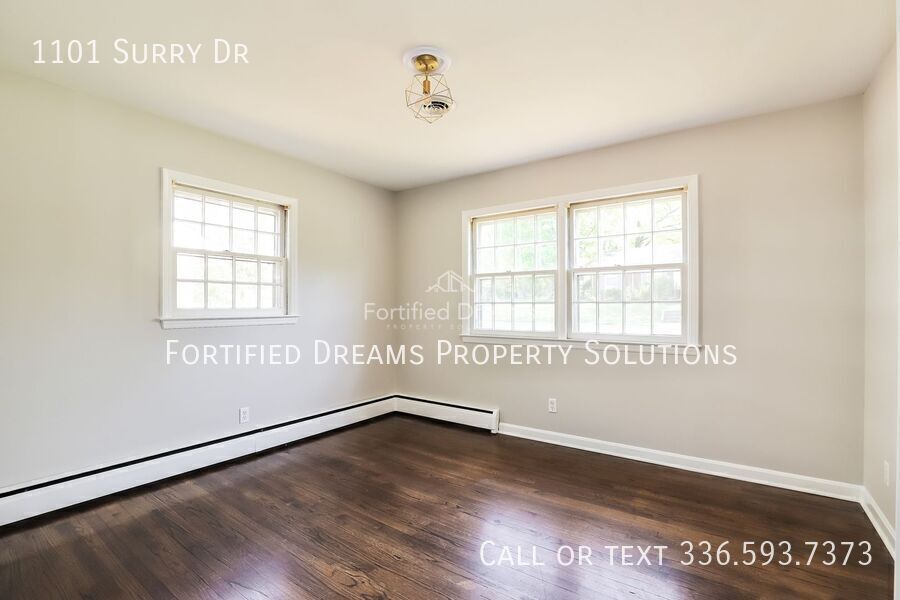 Available August 10: 3 Bed / 3 Bath Brick Ranch on Surry Dr, Guilford Hills, Large Basement & 2 Bonus Rooms property image