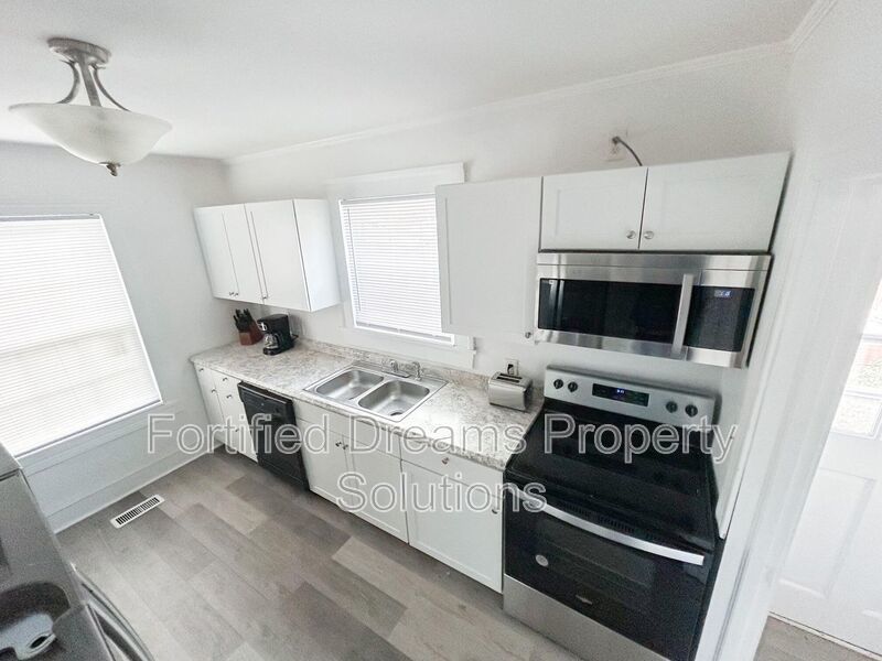 Historic Charm Meets Modern Comfort: Fully Furnished Mid-Term Rental in Siler City! property image