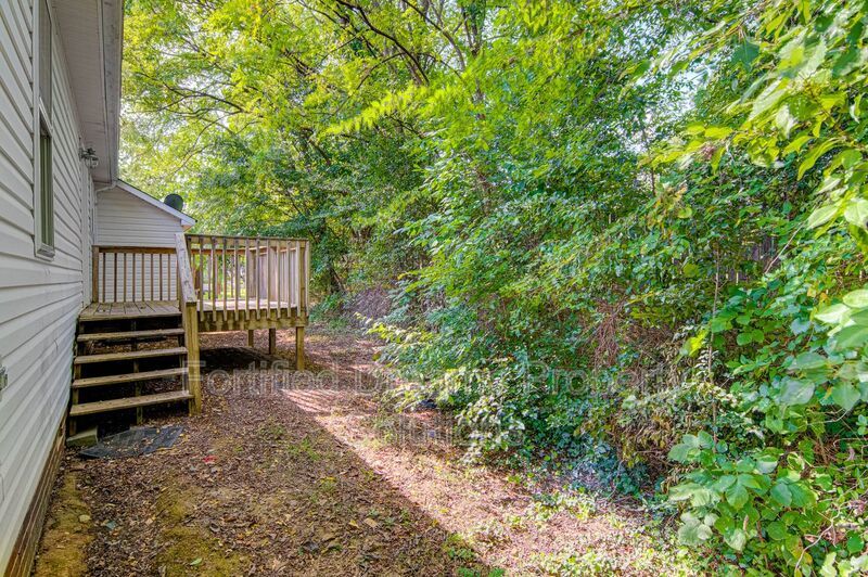 Charming 3BR/2BA Home in Greensboro | Newly Updated, Deck & Vaulted Ceilings property image