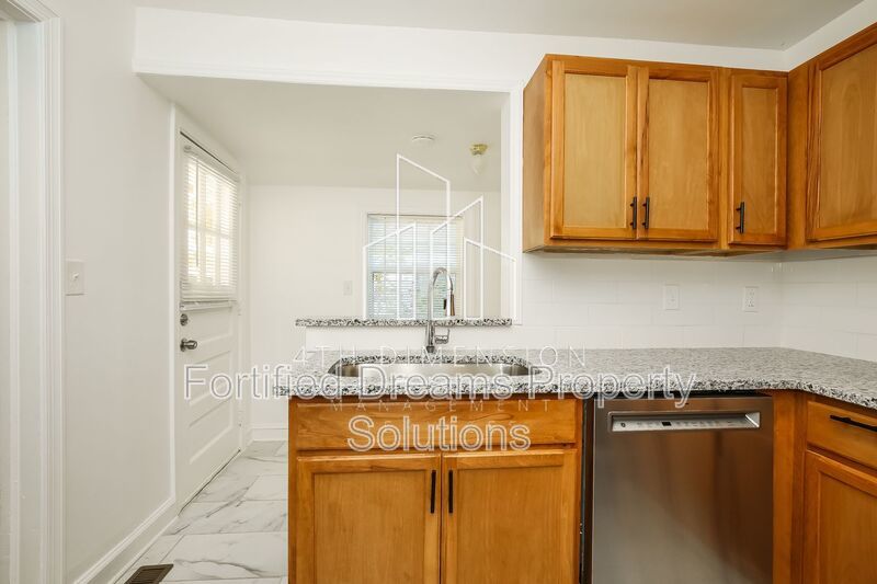 Charming 3-Bed Home - Cozy 936 Sq Ft - Covered Parking & Large Storage Shed property image