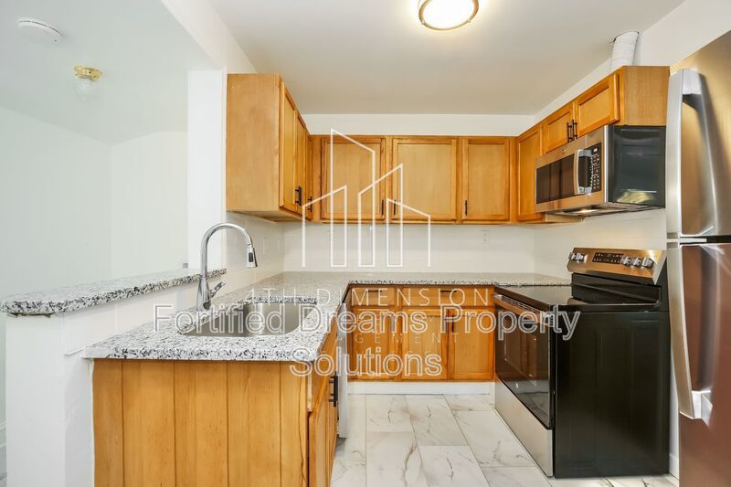 Charming 3-Bed Home - Cozy 936 Sq Ft - Covered Parking & Large Storage Shed property image