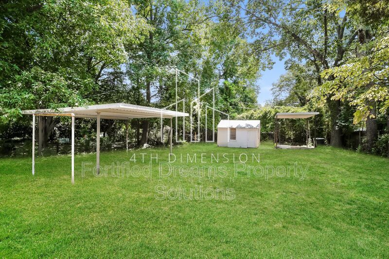 Charming 3-Bed Home - Cozy 936 Sq Ft - Covered Parking & Large Storage Shed property image