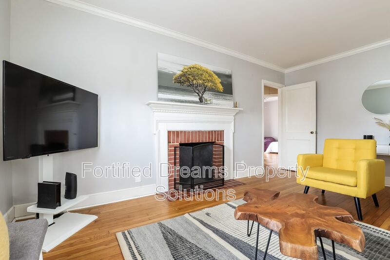 Charming Furnished 2-Bedroom Cottage with Fenced Yard in 27408! property image