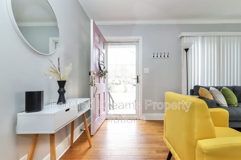 Charming Furnished 2-Bedroom Cottage with Fenced Yard in 27408! property image